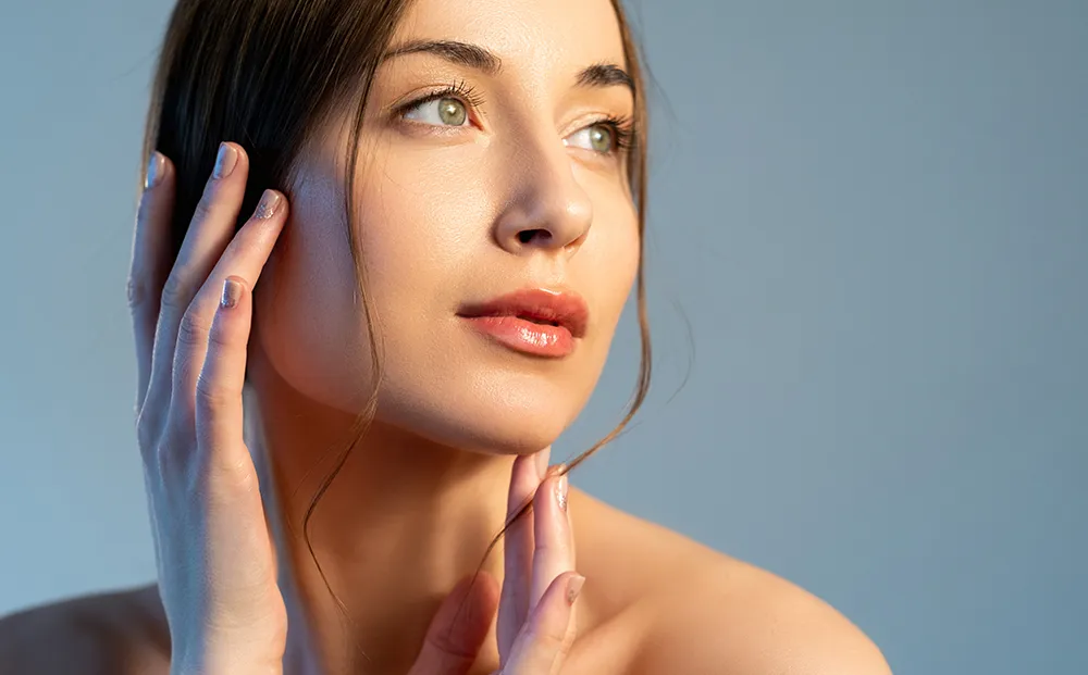 Dark hair woman looking up | Facelift | Dr. Nikolov